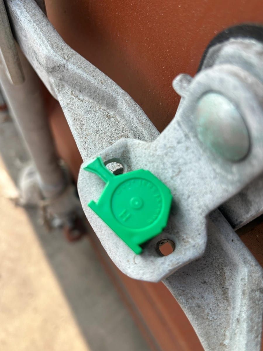 Container seal and locking hardware checked before pipe export shipment from China